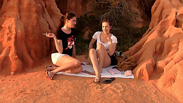 Outdoor lesbian pussy insertion with Francesca and Stella